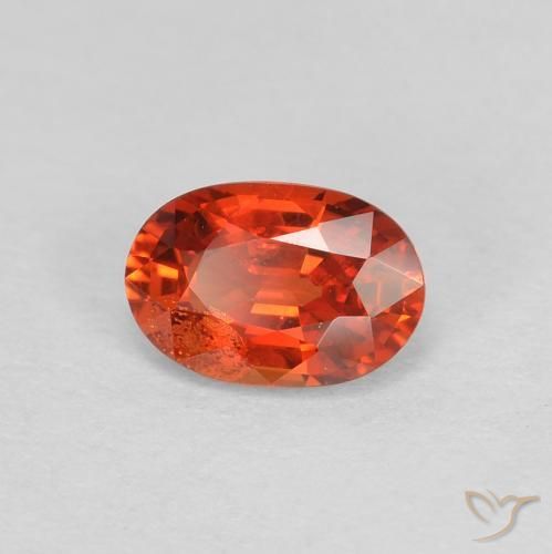 Zafiro Naranja rojizo natural de 0.60 ct, Ovalada, VS