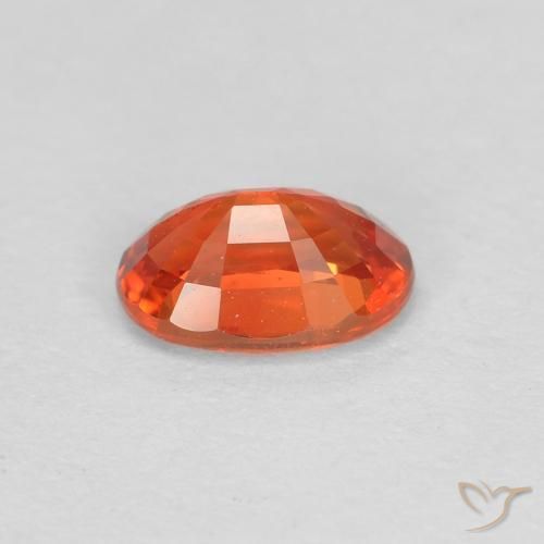 Zafiro Naranja rojizo natural de 0.60 ct, Ovalada, VS