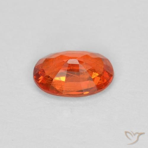 Zafiro Naranja rojizo natural de 0.55 ct, Ovalada, VS
