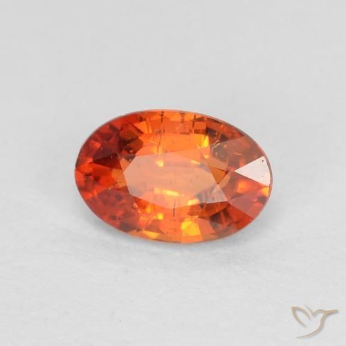 Zafiro Naranja rojizo natural de 0.65 ct, Ovalada, VS