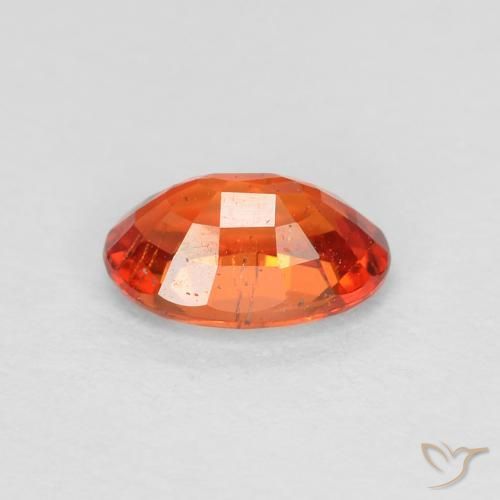 Zafiro Naranja rojizo natural de 0.65 ct, Ovalada, VS