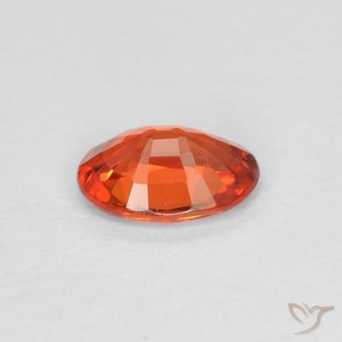 Zafiro Naranja rojizo natural de 0.49 ct, Ovalada, VS
