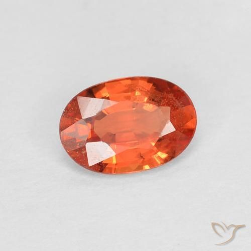 Zafiro Naranja rojizo natural de 0.49 ct, Ovalada, VS