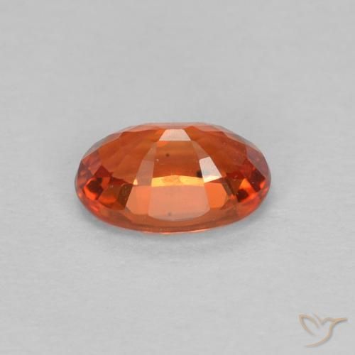 Zafiro Naranja rojizo natural de 0.64 ct, Ovalada, VVS-VS