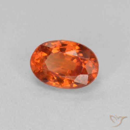 Zafiro Naranja rojizo natural de 0.67 ct, Ovalada, VVS-VS
