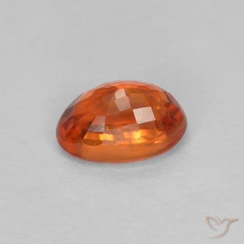 Zafiro Naranja rojizo natural de 0.67 ct, Ovalada, VVS-VS