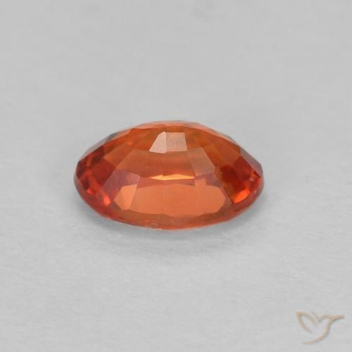 Zafiro Naranja rojizo natural de 0.62 ct, Ovalada, VVS-VS