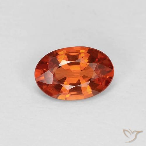 Zafiro Roja Anaranjada natural de 0.49 ct, Ovalada, VVS