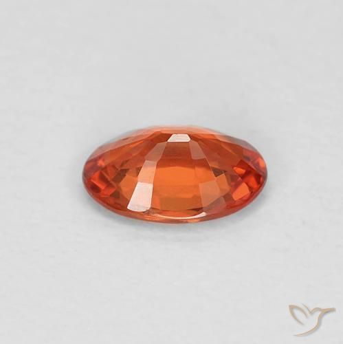 Zafiro Roja Anaranjada natural de 0.49 ct, Ovalada, VVS