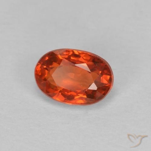 Zafiro Naranja rojizo natural de 0.65 ct, Ovalada, VVS