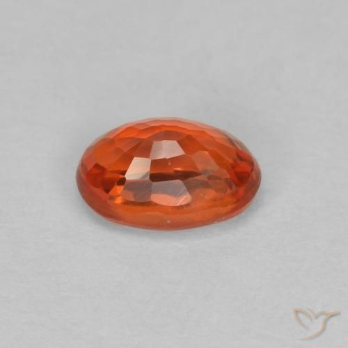 Zafiro Naranja rojizo natural de 0.65 ct, Ovalada, VVS