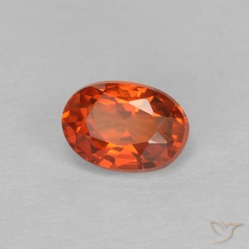 Zafiro Naranja rojizo natural de 0.67 ct, Ovalada, VVS