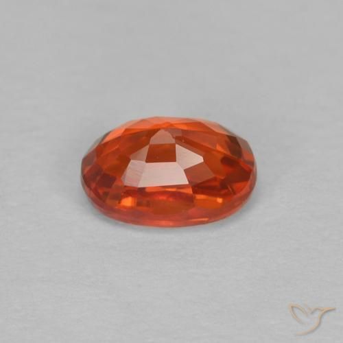Zafiro Naranja rojizo natural de 0.67 ct, Ovalada, VVS