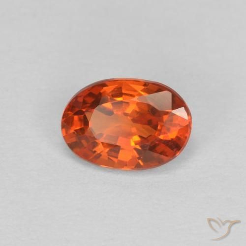 Zafiro Naranja rojizo natural de 0.59 ct, Ovalada, VVS