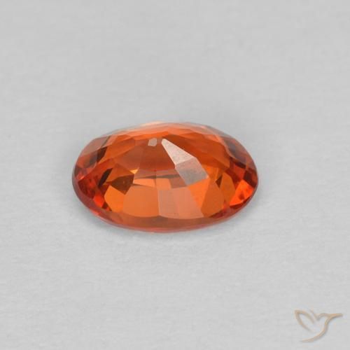 Zafiro Naranja rojizo natural de 0.59 ct, Ovalada, VVS