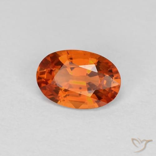 Zafiro Naranja rojizo natural de 0.60 ct, Ovalada, VVS