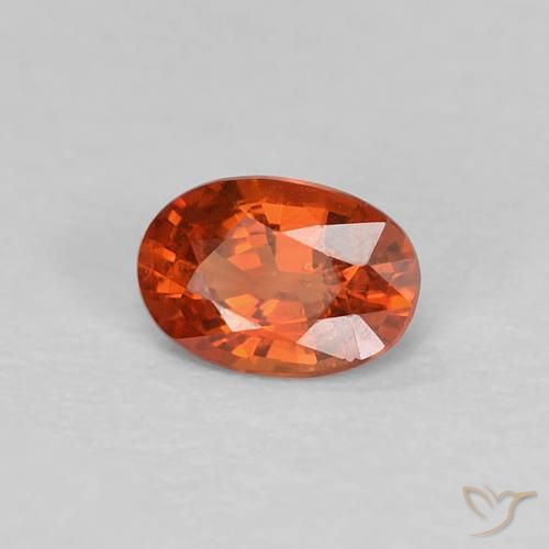 Zafiro Rojo ámbar oscuro natural de 0.47 ct, Ovalada, VS