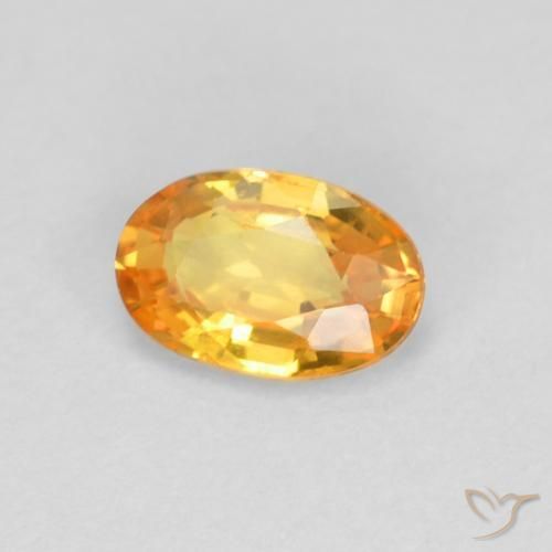 Zafiro Dorado naranja natural de 0.60 ct, Ovalada, VVS-VS