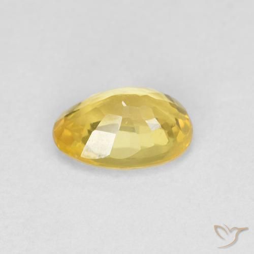 Zafiro Amarillo miel natural de 0.63 ct, Ovalada, VVS