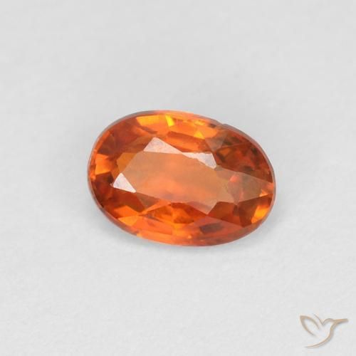 Zafiro Naranja rojizo natural de 0.56 ct, Ovalada, VVS