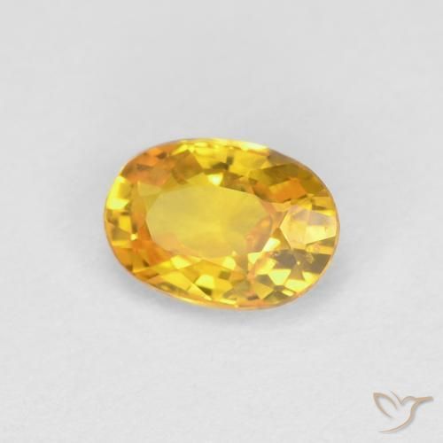Zafiro Dorado natural de 0.61 ct, Ovalada, VVS