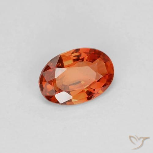 Zafiro Naranja rojizo natural de 0.39 ct, Ovalada, VVS