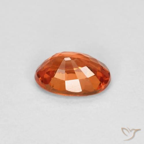 Zafiro Naranja rojizo natural de 0.60 ct, Ovalada, VVS