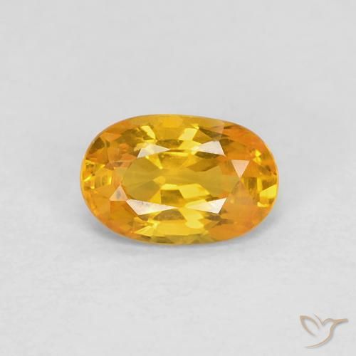 0.62ct Natural Dorado naranja Zafiro, Ovalada, VVS