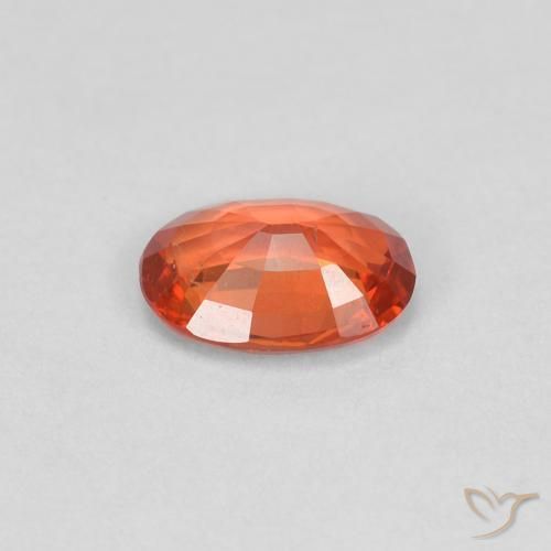 Zafiro Naranja rojizo natural de 0.47 ct, Ovalada, VS