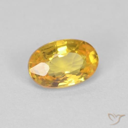 Zafiro Dorado natural de 0.62 ct, Ovalada, VS