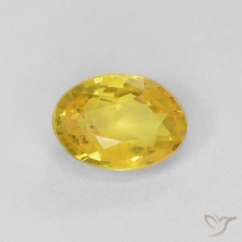 0.56ct Natural Amarillo medio Zafiro, Ovalada, VS