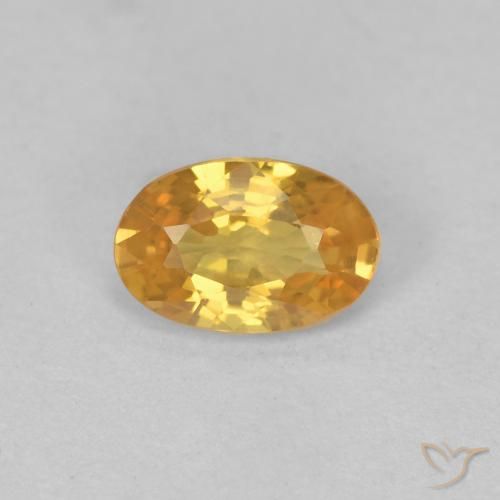 0.57ct Natural Naranja dorado intenso Zafiro, Ovalada, VS