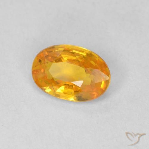 Zafiro Naranja medio natural de 0.55 ct, Ovalada, VS