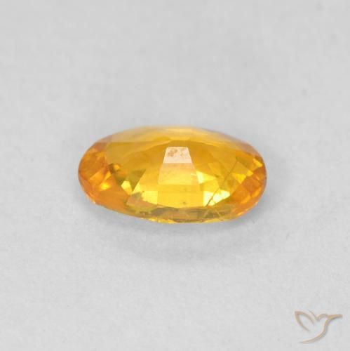 Zafiro Naranja medio natural de 0.55 ct, Ovalada, VS