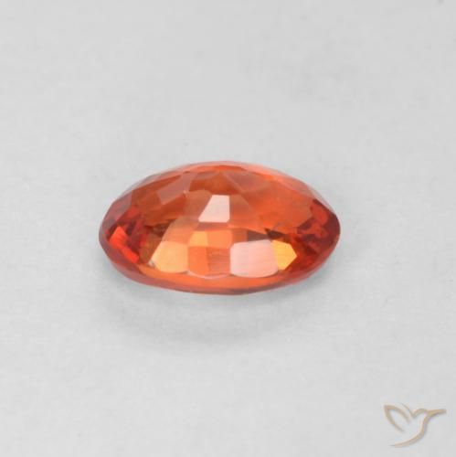 Zafiro Naranja rojizo natural de 0.57 ct, Ovalada, VS