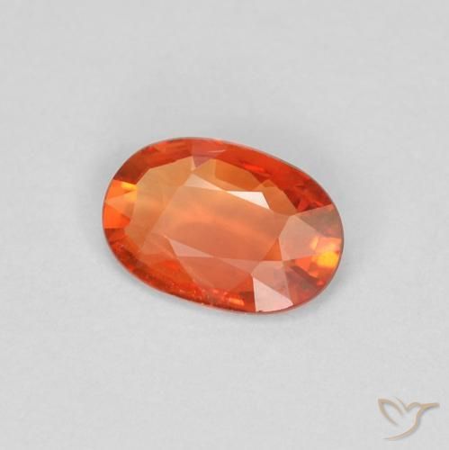 Zafiro Naranja rojizo natural de 0.39 ct, Ovalada, VVS