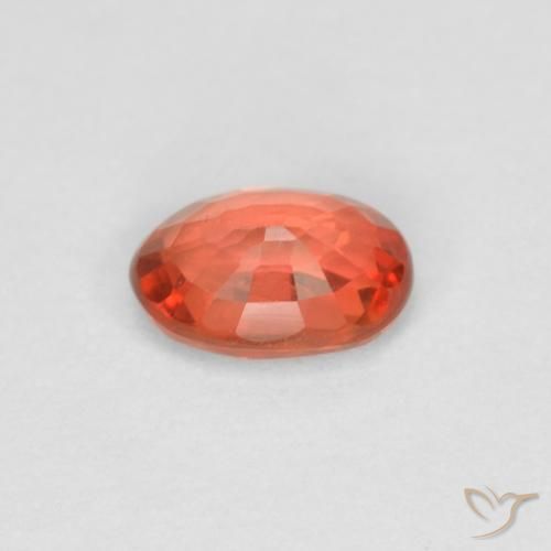 Zafiro Naranja rojizo natural de 0.58 ct, Ovalada, VVS-VS