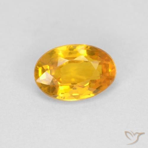 0.67ct Natural Dorado naranja Zafiro, Ovalada, VVS