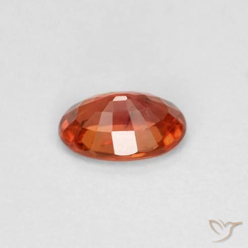 Zafiro Naranja medio natural de 0.58 ct, Ovalada, VS