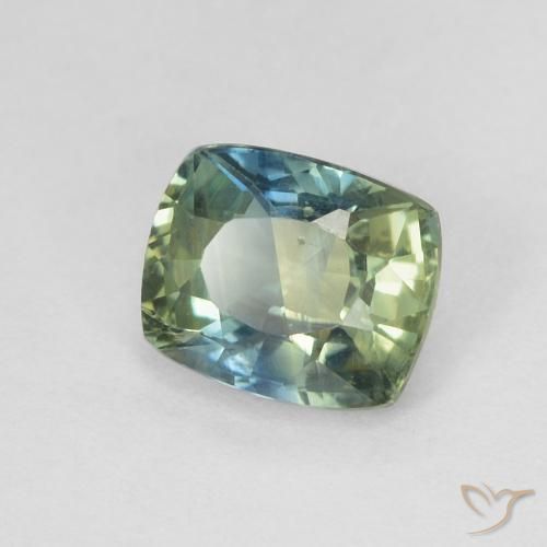 Zafiro Azul verdoso natural de 0.78 ct, Forma Cojín, VS