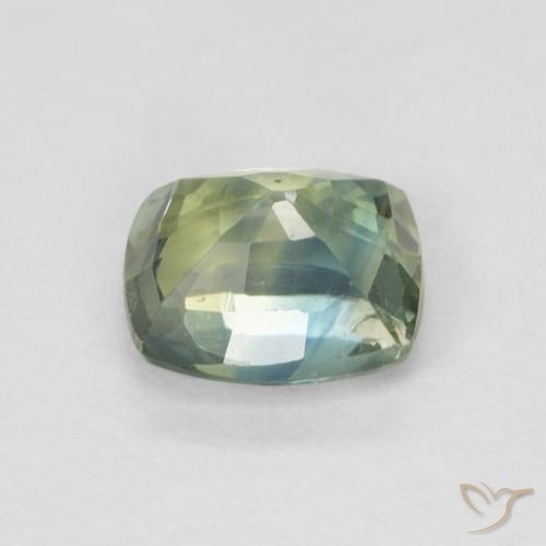 Zafiro Azul verdoso natural de 0.78 ct, Forma Cojín, VS