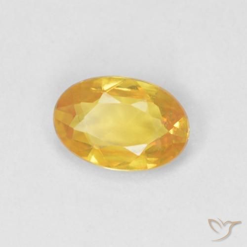 Zafiro Dorado claro natural de 0.54 ct, Ovalada, VVS