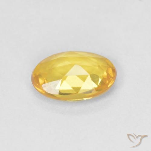 Zafiro Dorado claro natural de 0.54 ct, Ovalada, VVS
