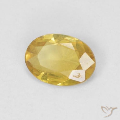 Zafiro Dorado medio natural de 0.61 ct, Ovalada, VVS-VS