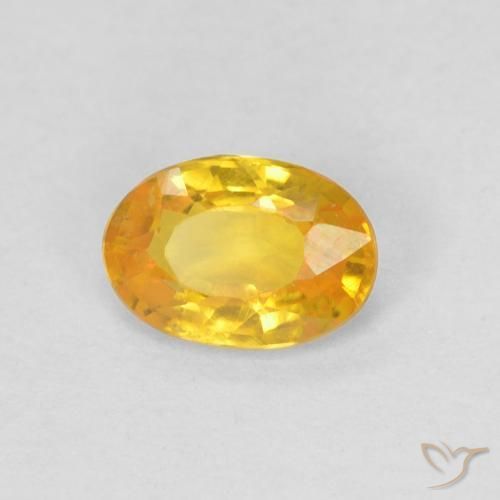 Zafiro Naranja dorado natural de 0.53 ct, Ovalada, VS