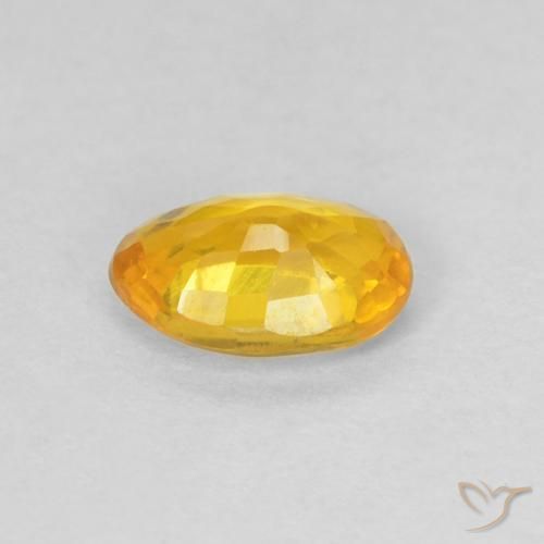 Zafiro Naranja dorado natural de 0.53 ct, Ovalada, VS