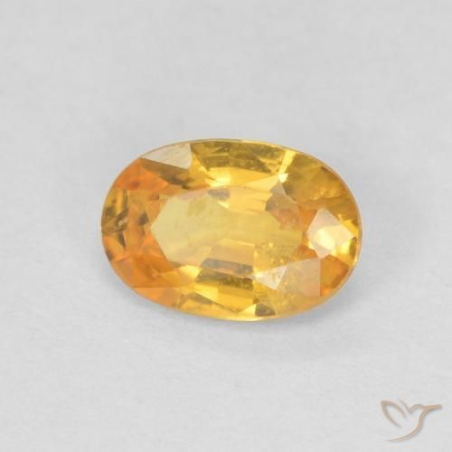 Zafiro Naranja dorado natural de 0.56 ct, Ovalada, VS