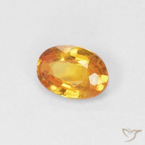 Zafiro Dorado naranja natural de 0.49 ct, Ovalada, VVS-VS