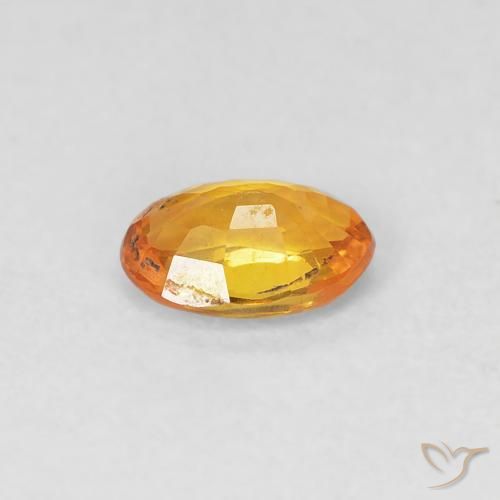 Zafiro Dorado naranja natural de 0.49 ct, Ovalada, VVS-VS
