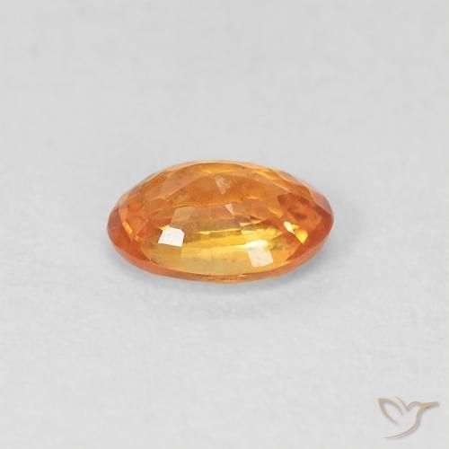 Zafiro Naranja medio natural de 0.53 ct, Ovalada, VVS-VS